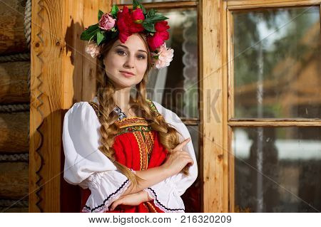 Russia, Moscow, Izmaylovsky Park, August 27, 2017. International Photo Festival.Beautiful woman portrait in russian style. Beautiful Russian girl in traditional dress. Russian style.
