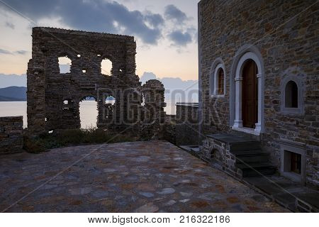 Historical architecture and a ruined house in Psara village, Greece.