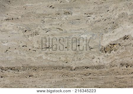 perla classic travertine texture background close up
