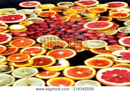 Compote of fruits. Fruit water. Russian sbiten. Compote of orange and strawberries.