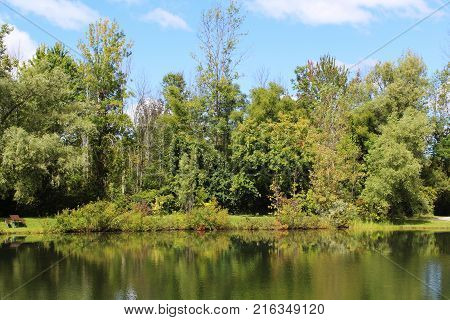 Early fall color reflecting on the water