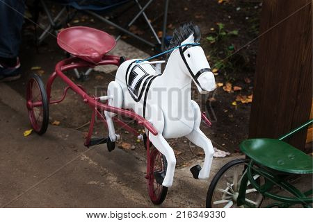 Retro bicycle. An old children's bicycle. Old Horse Bike