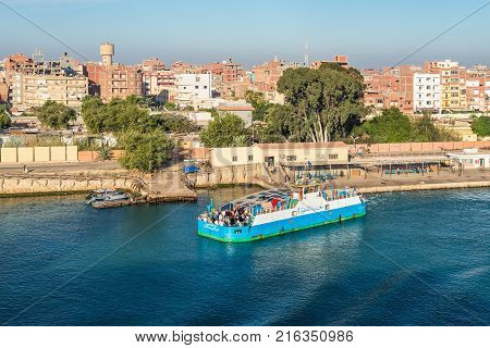El Qantara Egypt - November 5 2017: West Qantara Ferryboat moored to the shore on the Suez Canal in the city El Qantara located in the Egyptian governorate of Ismailia 50 kilometres south of Port Said.