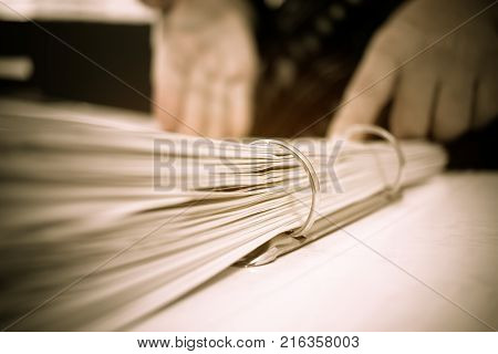 Hands business checking documents management folders in office for Annual Report files on Abstract blurred photo of businessman hands working with laptop computer. business busy concept