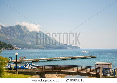 Montenegro, Budva - May 30/2017: Tourists Walk Along The Embankment Visiting The Sights.