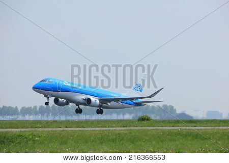 Amsterdam the Netherlands - May 6th 2017: PH-EXK KLM Cityhopper Embraer ERJ-175STD takeoff from Polderbaan runway Amsterdam Schiphol Airport
