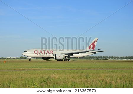 Amsterdam the Netherlands - June 9th 2016: A7-BFC Qatar Airways Cargo Boeing 777-FDZ takeoff from Polderbaan runway destination Doha Qatar
