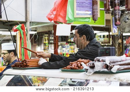 TEL AVIV , ISRAEL - 21 NOVEMBER 2017: Sellers on the old grocery street Nahalat-Benjamin