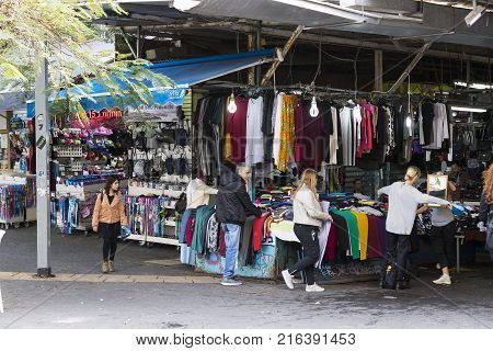 TEL AVIV , ISRAEL - 21 NOVEMBER 2017: Sellers on the old grocery street Nahalat-Benjamin
