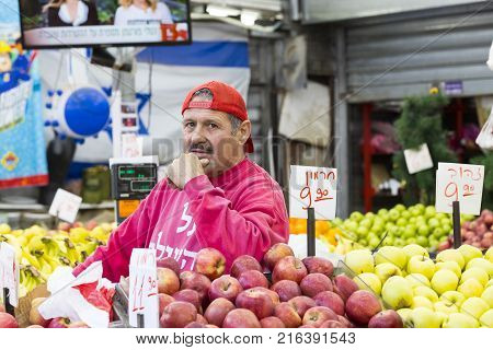TEL AVIV , ISRAEL - 21 NOVEMBER 2017: Sellers on the old grocery street Nahalat-Benjamin