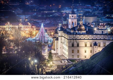 Vilnius, Lithuania: Christmas tree and decorations in Cathedral Square, aerial top view
