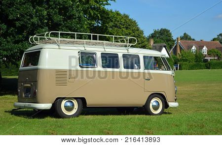 ICKWELL, BEDFORDSHIRE, ENGLAND -  JULY 02, 2017: Classic Volkswagen Camper Van parked on village green.