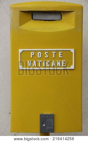 A mailbox at the Vatican Post Office at Vatican City in Rome Italy.Text is translated in Englisch: post of the Vatican.
