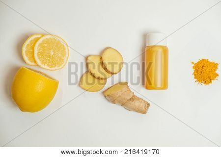 Ginger Shot Healthy Drink With Curd In A Plastic Bottle On White Background. Immunity Boosting Tonic