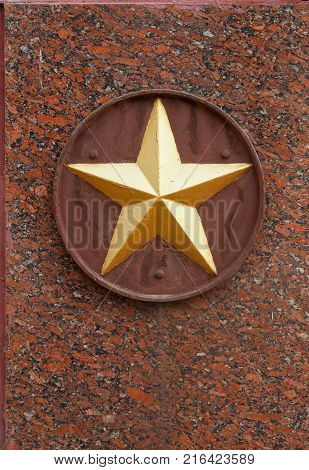 Soviet star on granite monument as a memory of soldier's heroism in the Great Patriotic War