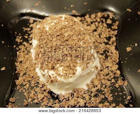 Chocolate Ice Cream And Hardered Chocolate Over