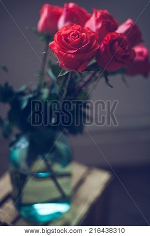 Luxury bouquet made of red roses in flower shop Valentines Bouquet of red roses. Close-up.