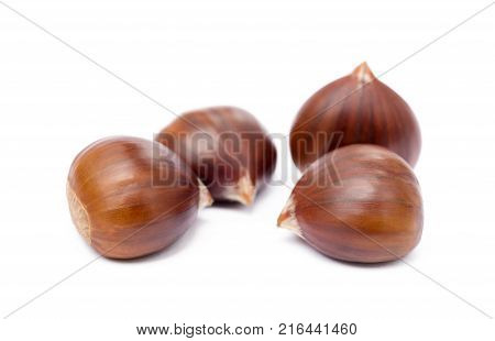 Fresh ripe chestnuts isolated on white background