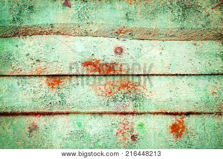Old wooden ruined house is yellow. Rural abandoned hut. Abandoned house.