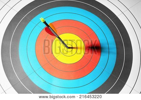 Arrow in the center of target for archery, closeup