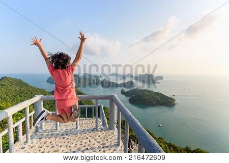 Woman Tourist On Peak Viewpoint Of Island