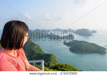 Woman Tourist On Peak Viewpoint Of Island