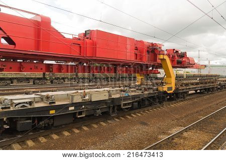 Railway tracklayers ready to lay the rails. Stop before starting work
