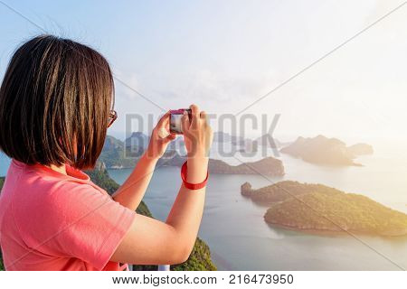 Woman Tourist On Peak Viewpoint Of Island