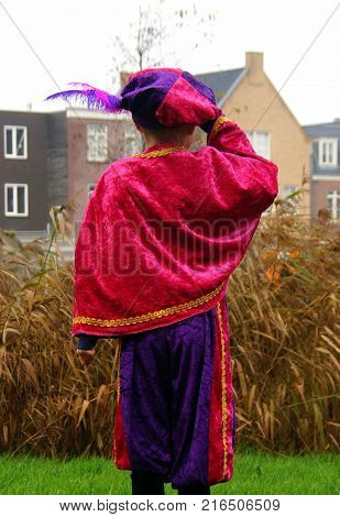 Backside of piet. Piet is a typical Dutch character in a traditional event celebrating the birthday of Sinterklaas.