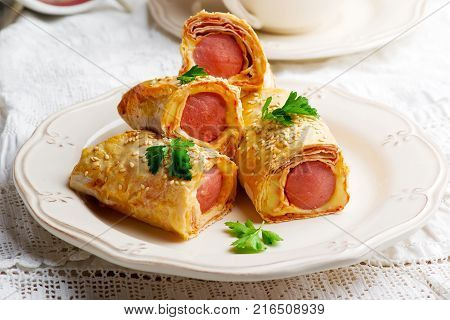 sausages with cheese in lavash for a breackfast. selective focus