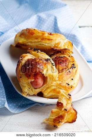 sausages in puff pastry for a breackfast. selective focus
