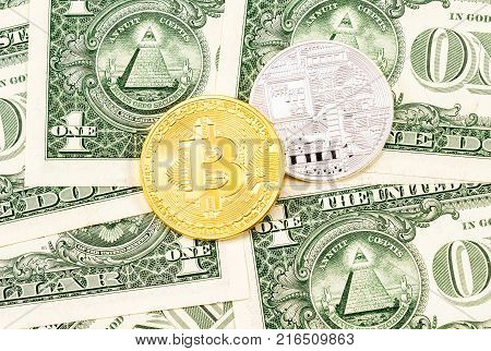 Physical version of Bitcoin on the american dollars. Business concept of worldwide cryptocurrency