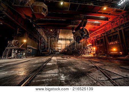 Pouring of liquid metal in open-hearth furnace