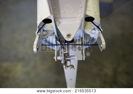 Aircraft tail inner parts. Steel, rivets and rope. Rudder control system.