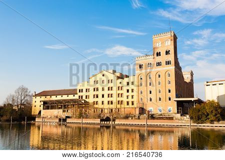 Industrial archeology along Sile river. Old abandoned factory. Italian landmark
