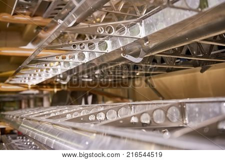 Airplane wing frames macro. Aircraft flap ribs, aluminium.