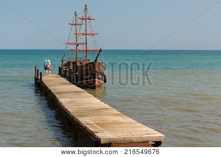 Koktebel, Russia - June 05, 2016: Sailing ship at the pier in the village of Koktebel
