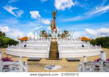 Nakornsawan, Thailand. - October 8, 2017 : Beautiful giant or big colorful dragon statue with blue sky at Nakornsawan Park, Thailand.