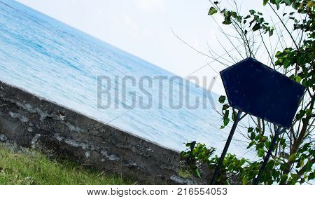 Crooked Arrow Sign Board at a Beach