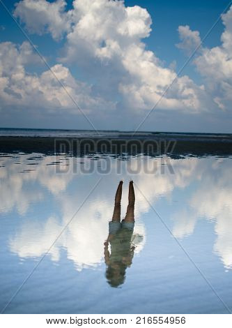 Girls Reflection in the water but the Girl is Invisible