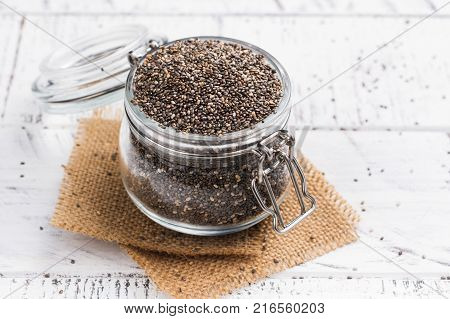 Healthy chia seeds in a glass jar. Healthy eating concept. Copy space