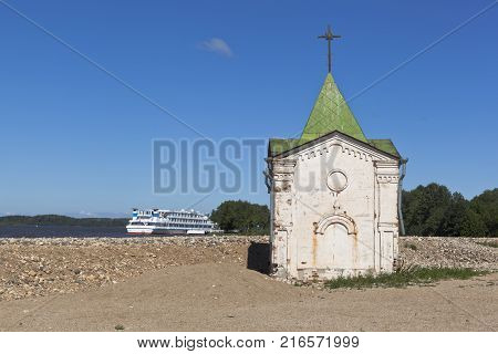 Goritsy, District of Kirillov, Vologda region, Russia - August 10, 2015: Chapel of St. John the Baptist on the banks of the Sheksna River, near Voskresensky Goritsky Monastery Vologda region