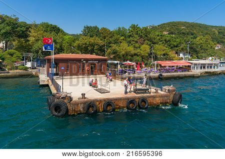 Istanbul Turkey - August 28 2013: Rumeli Kavagi ferry wharf with people