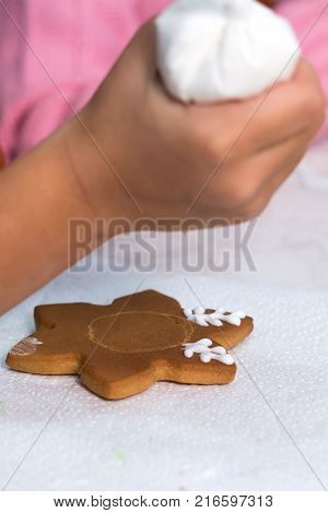 Homemade Christmas Gingerbread Decorated In The Form Of Mittens On The Background Of A White Napkin