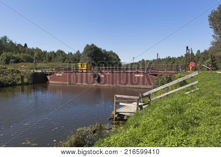 Belozersk, Vologda region, Russia - August 10, 2015: Swing bridge on Belozyorsk channel in the Vologda region