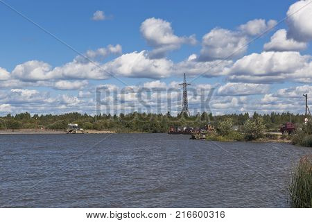 Belozersk, Vologda region, Russia - August 10, 2015: Krohinskaya ferry service across the river Sheksna on the road Belozersk - Lipin Bor Vologda Region