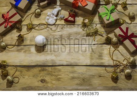 Piece Of Kraft Paper And Three Flowers Of Different Colors