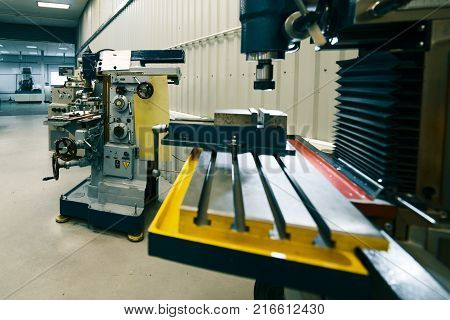 Machining shop, two vertical milling machine. Metalworking equipment