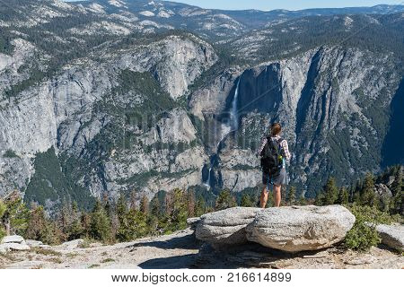 Woman Looks Out Over Yosemite Valley in Summer
