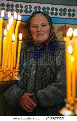 VOYUTYN UKRAINE - 14 October 2008: Ukrainian parishioner of the Orthodox Church during the religious celebration Pokrov